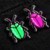 Glitch Beetle Pin Pair close up